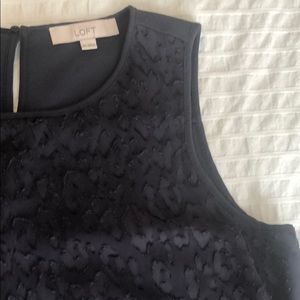 Loft sleeveless dark grey top with navy undertones